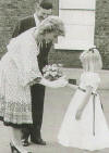 Miss Russell presents a posy to the Colonel in Chief